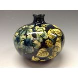 A Doulton Lambeth Faience compressed ovoid vase, painted by Josephine A Durtnall,