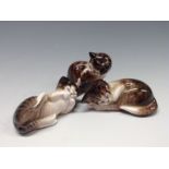 A RoyaL Doulton model, of kitten licking her paws, pritned mark, HN2580;   others, sleeping, HN2581,