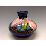 A Moorcroft Magnolia compressed baluster vase,