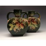 A pair of Bretby Barbotine amphora-type vases,