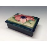 A Moorcroft Poppy pattern rectangular powder bowl and cover,