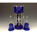 An early 20th century cobalt blue and milk glass table lustre, clear prismatic lustres,