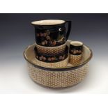 A Bretby combination Cloisonné and wicker toilette set,