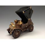 A Bretby novelty model of an early 20th century motor car, earthy grey glaze, black canopy,