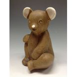 A Bourne Denby  novelty bear hot water bottle, in the brown, with white glazed ears and nose,