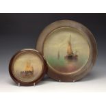 A Bretby Matzone and Bronze circular plaque, painted with a sailing boat on a still sea,