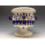 A mid 20th century English pottery campana shaped leech jar,