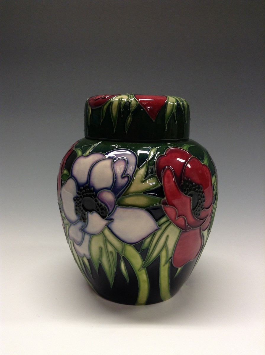 A contemporary Moorcroft Poppy pattern ginger jar,