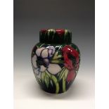 A contemporary Moorcroft Poppy pattern ginger jar,