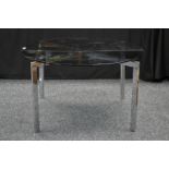 A Mies Van Der Rohe style Barcelona coffee table, chrome X frame stand,