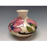 A Moorcroft Magnolia compressed baluster vase,