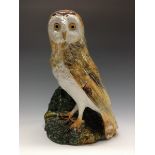 A Bretby model of Barn Owl, naturalistically modelled and glazed in tones of white, orange,