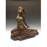 An Art Deco style bronze, of an Eastern Lady dancing, in colours,