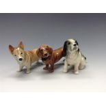 A Bretby model of a Dachsund, oustretched tail, collar, 7.