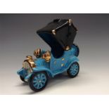 A Bretby novelty model of an early 20th century motor car, light blue glaze, black matt canopy,