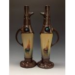 A matched pair of Bretby Matzone and Copperette ewers,