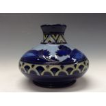 A contemporary Moorcroft  Second Dawn Eventide pattern compressed globular vase,