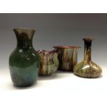 A Bretby baluster vase, of Chinese inspiration, flown dark green glaze, 18cm high, impressed marks,