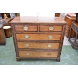 A George III mahogany crossbanded oak chest of two short and three long graduated cockbeaded