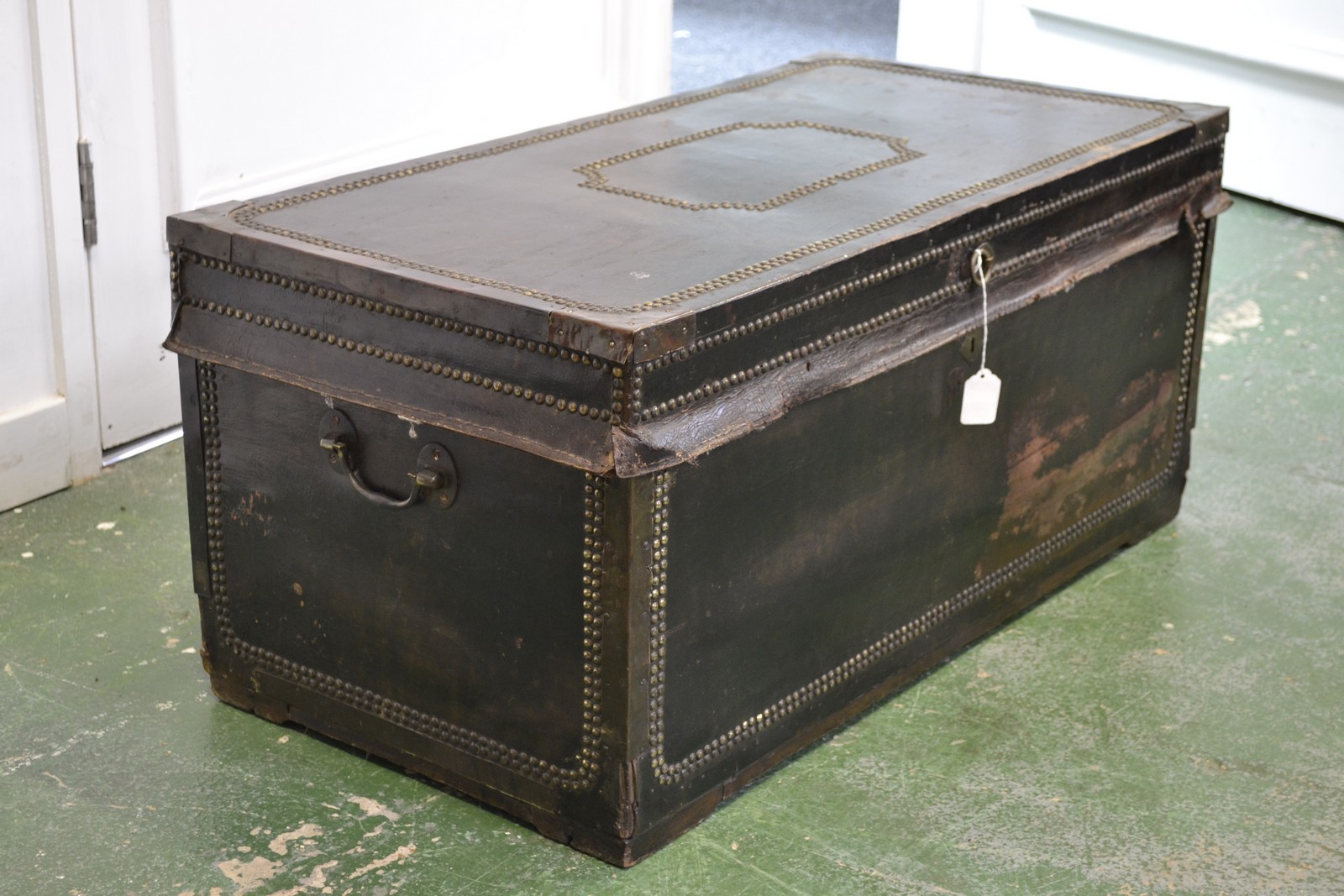 A Spanish leather and camphor rectangular travelling trunk,