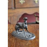 Pierre Jules Mene, after, a dark patinated bronze, of a playful greyhound and his ball, oval base,