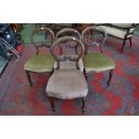 A set of four Victorian walnut balloon back chairs, horizontal shaped splat,