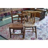 A George III elm country kitchen chair; another chair.