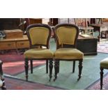 A pair of George III spoon back hall chairs, mahogany frames, turned and carved legs,