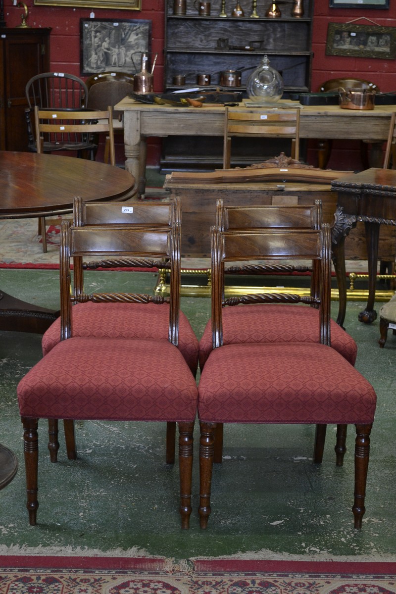 A set of four 19th century mahogany dining chairs, incurved cresting rails,