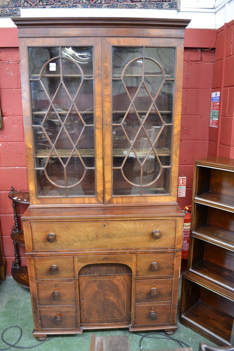 An early 19th century mahogany secretaire bookcase, stepped cornice,