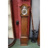 An early to mid-20th century oak short case hall clock