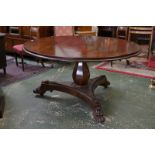 A William IV mahogany centre table, circular tilting top, panelled baluster column,