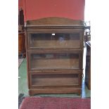 A Globe Wernicke type oak three section stacking bookcase, c.