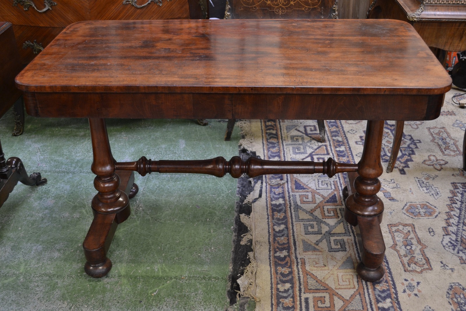 A George IV mahogany rounded rectangular library table,