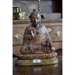 A Chinese soapstone carving, of Buddha, seated in a lotus,