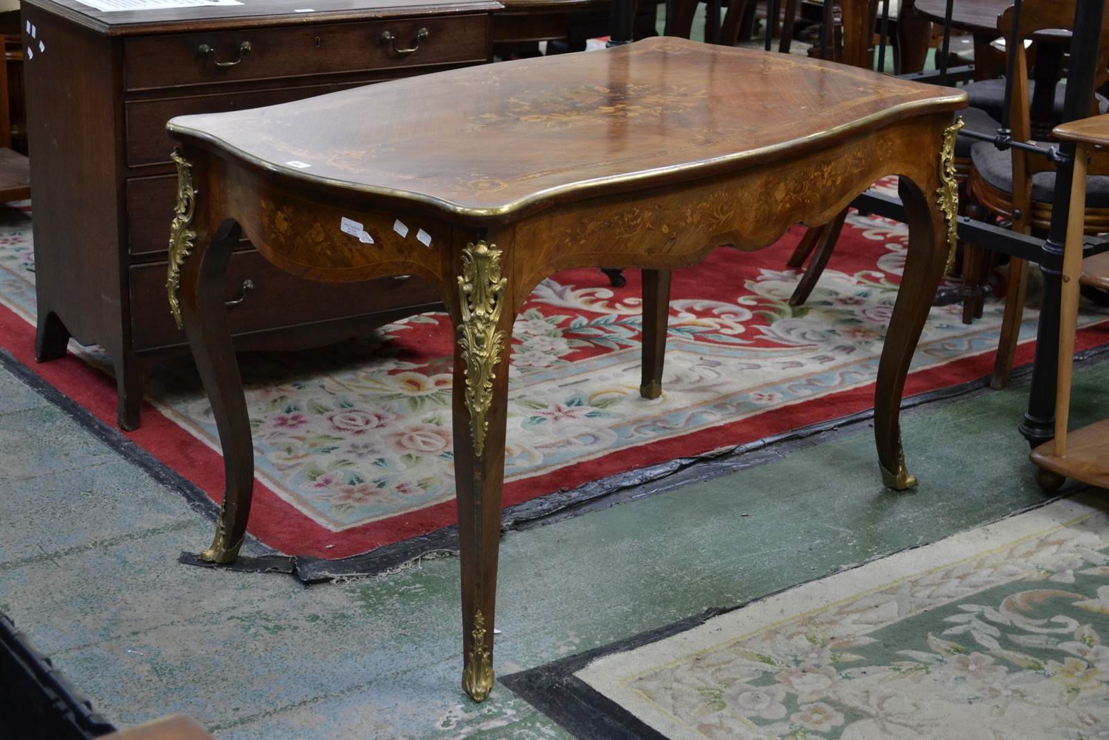 A 19th century French ormolu mounted kingwood and marquetry bureau plat,