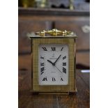 A laquered brass carriage clock, Walker & Hall.