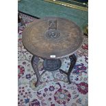 An Edwardian oak occasional table inspired by King Arthur's Round Table