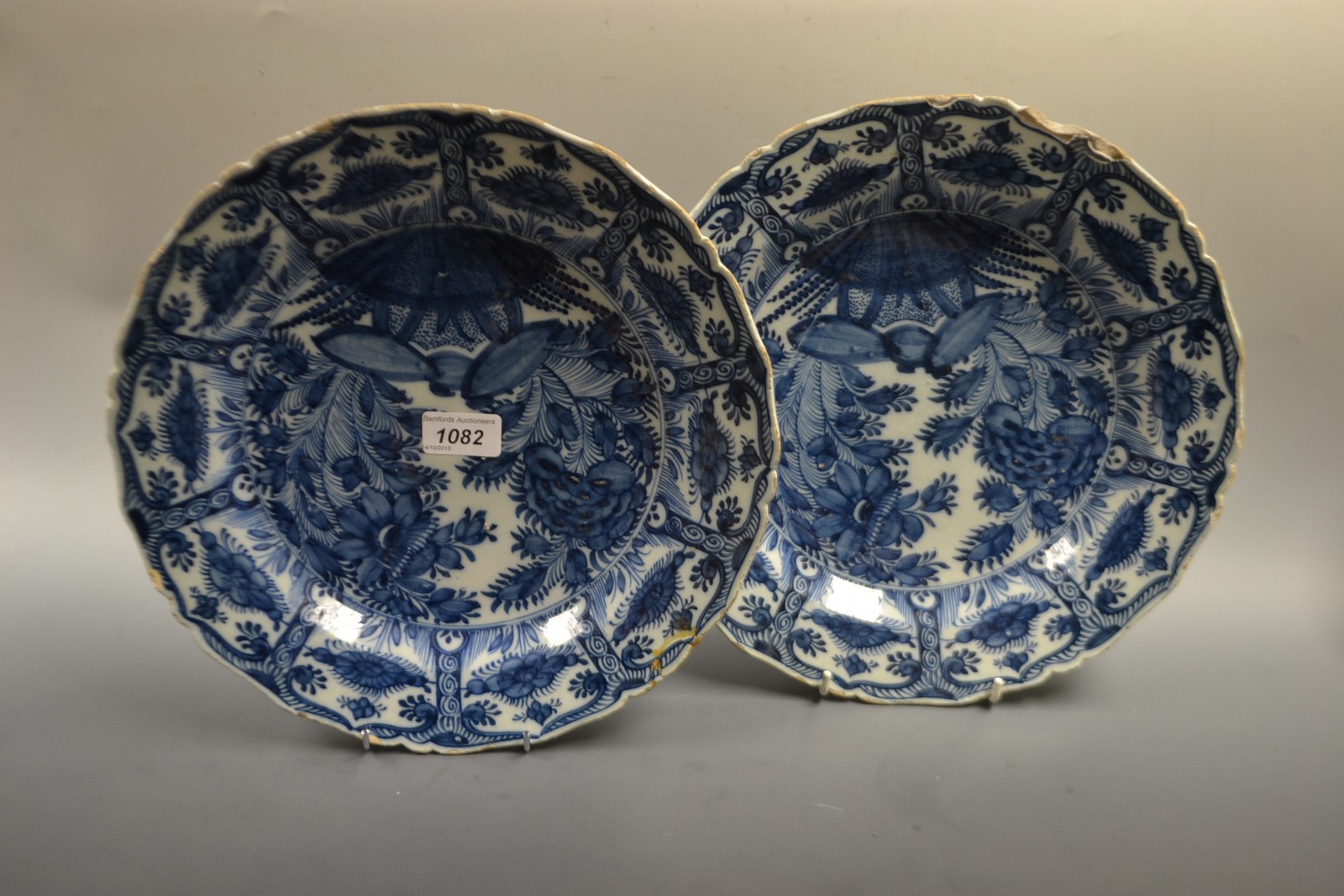 A pair of Dutch Delft shaped circular plates,