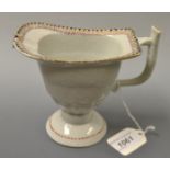 A Chinese helmet shaped cream jug, geometrical banded border, rustic angular handle, 11.5cm high, c.