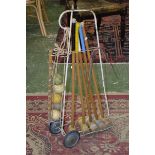 A La Cancha child's croquet set with mallets, hoops, balls and trolley.