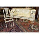 A chinoiserie writing desk, curving superstructure with an arrangement of drawers and cupboards,