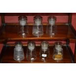Medical - Pharmacy - a set of seven spreading cylindrical chemist's apothecary jars, domed stoppers,