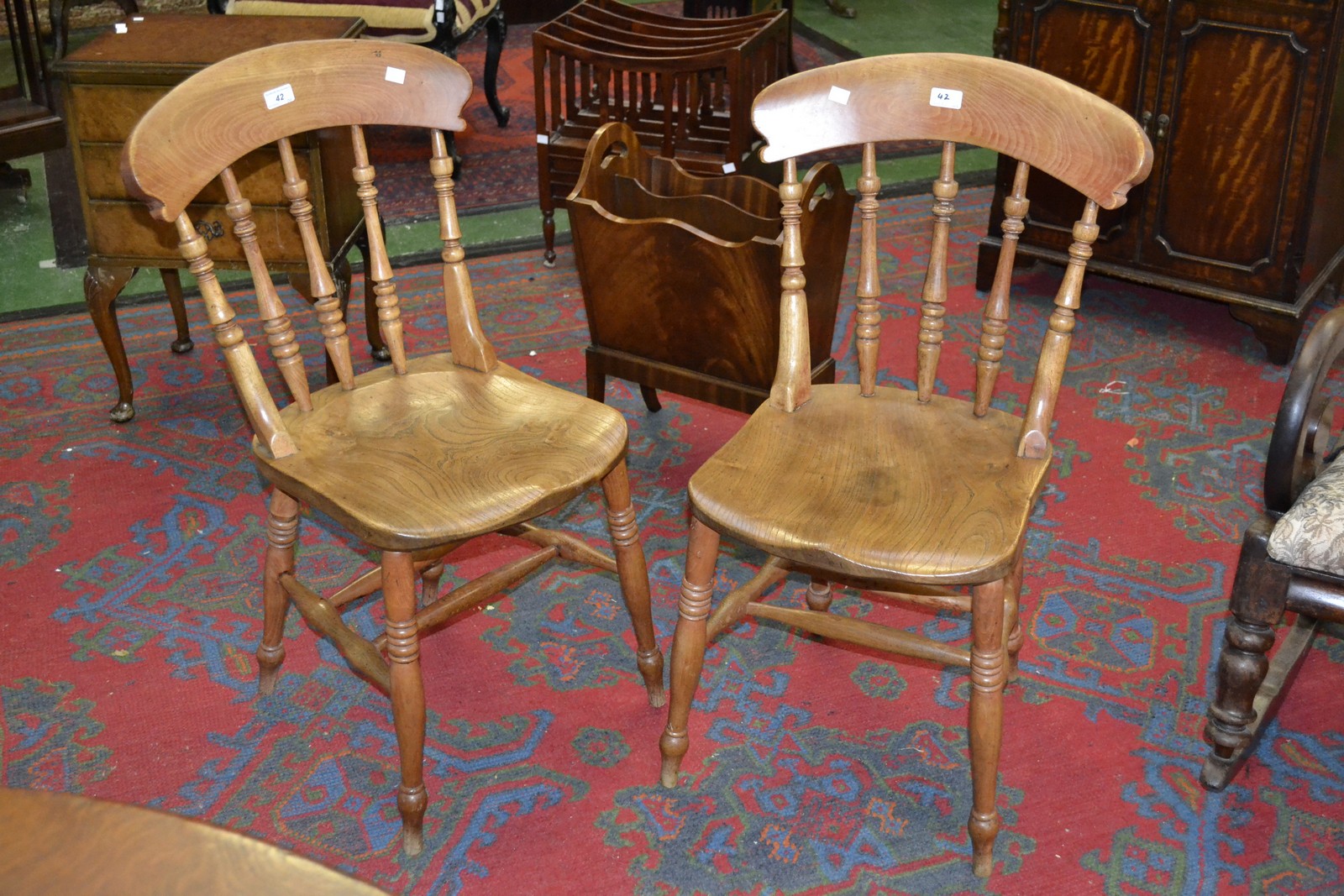 A pair of Victorian elm kitchen chairs