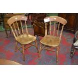 A pair of Victorian elm kitchen chairs