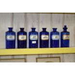 Medical - Pharmacy - six blue glass chemist's apothecary syrup bottles, Limonis, Simplex, Rhei,