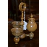 Treen - a 19th century turned boxwood cruet, posted ring handle,