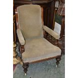 A Victorian mahogany library chair, scrolling padded back, padded arms with turned supports,