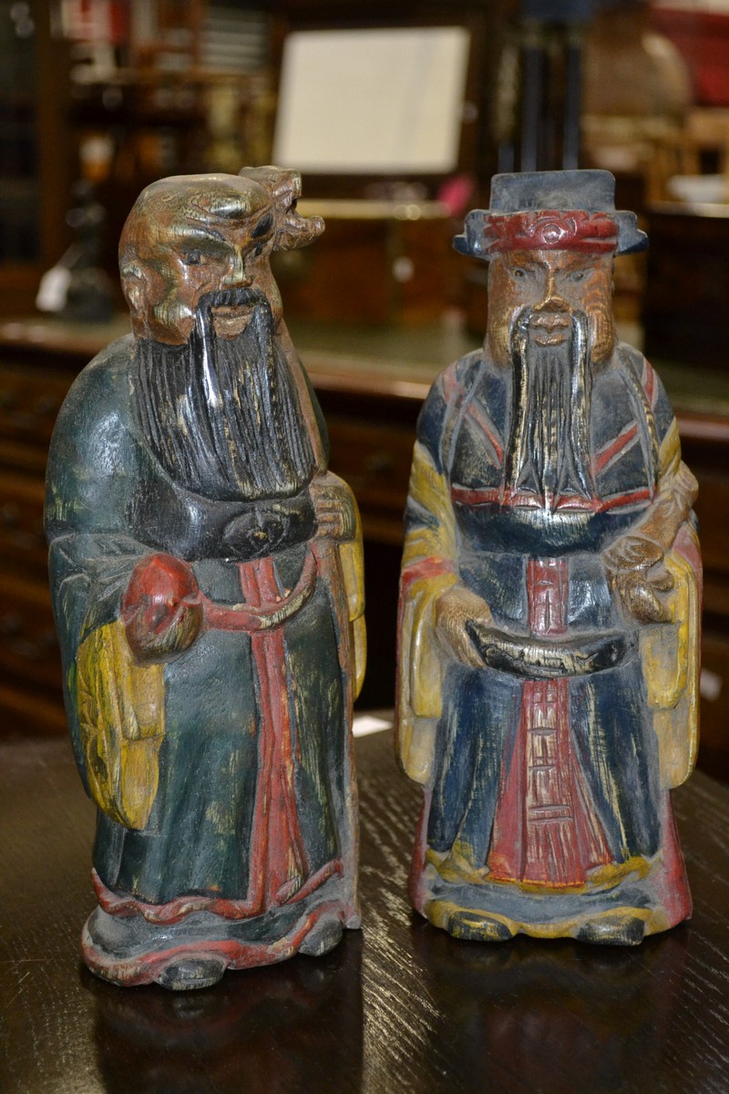 A pair of Chinese carved wood and polychrome immortals