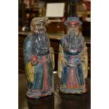 A pair of Chinese carved wood and polychrome immortals